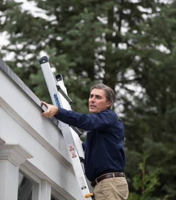 inspecting roof