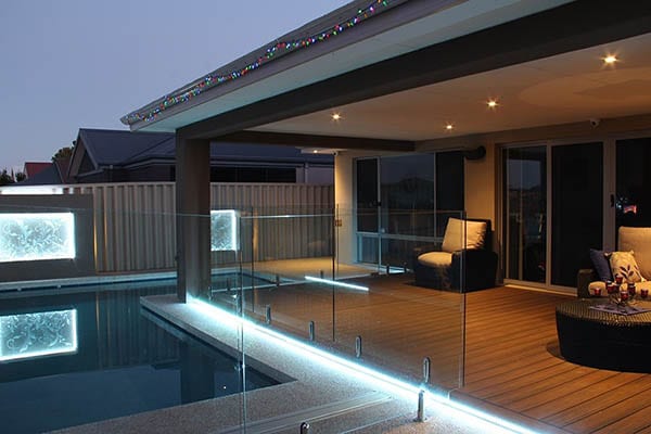 Modern backyard deck with pool